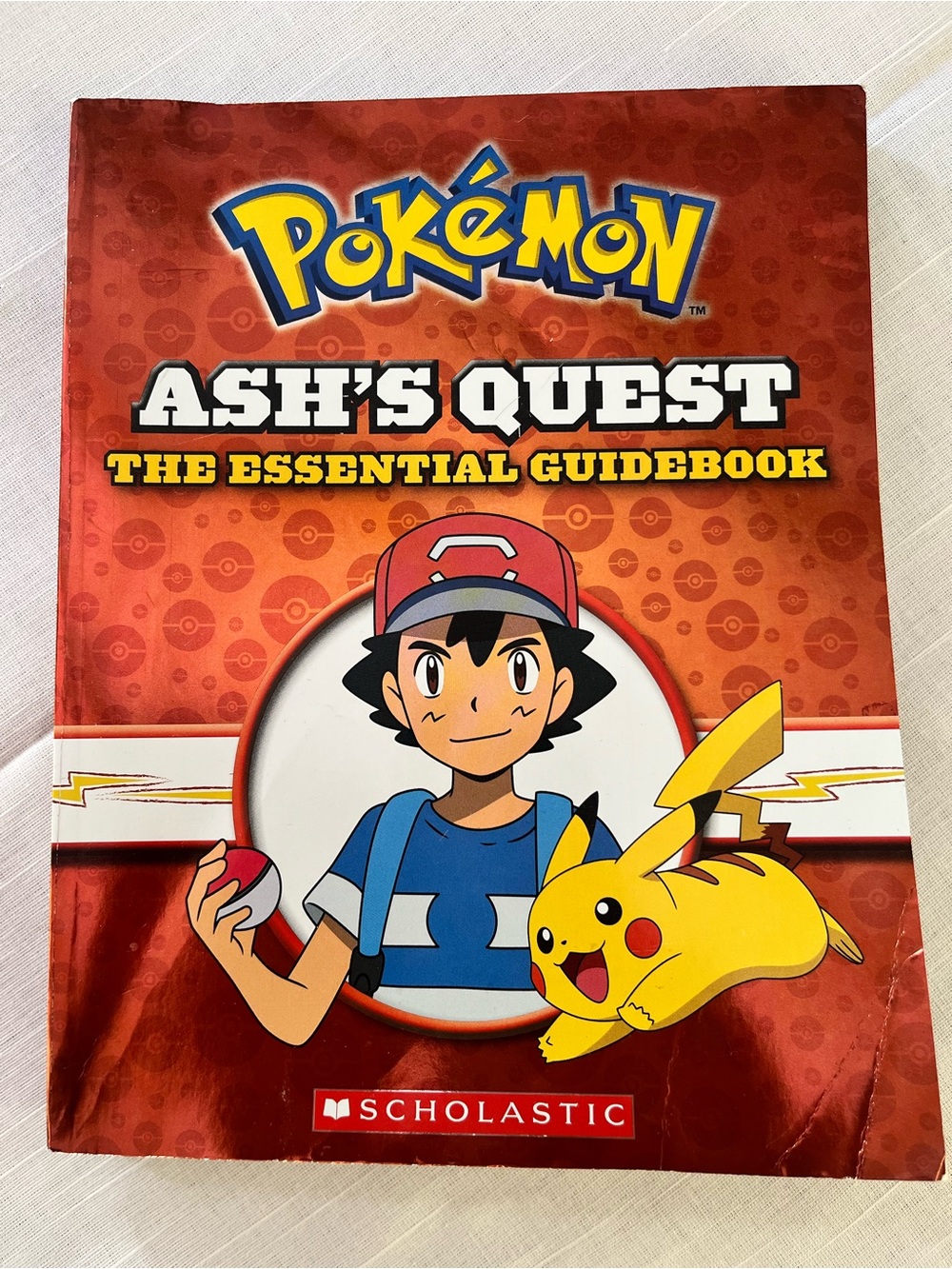 Scholastic Pokémon Guidebook Red Cover with Yellow Accents